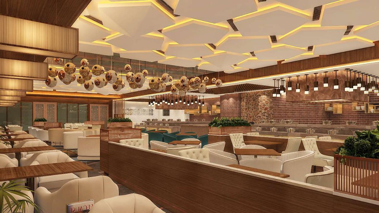 Radisson Blu Towers Kaushambi Delhi Ncr Hotel Газиабад Екстериор снимка Interior of a restaurant